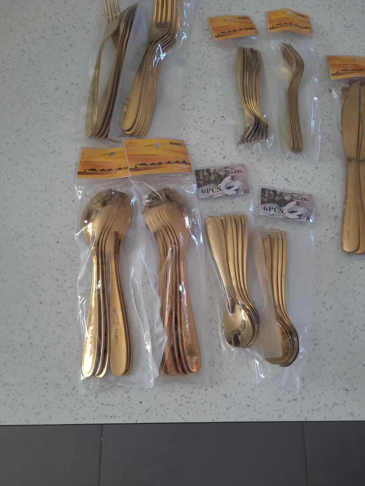 Set of gold cutlery for 12 people – photo 2